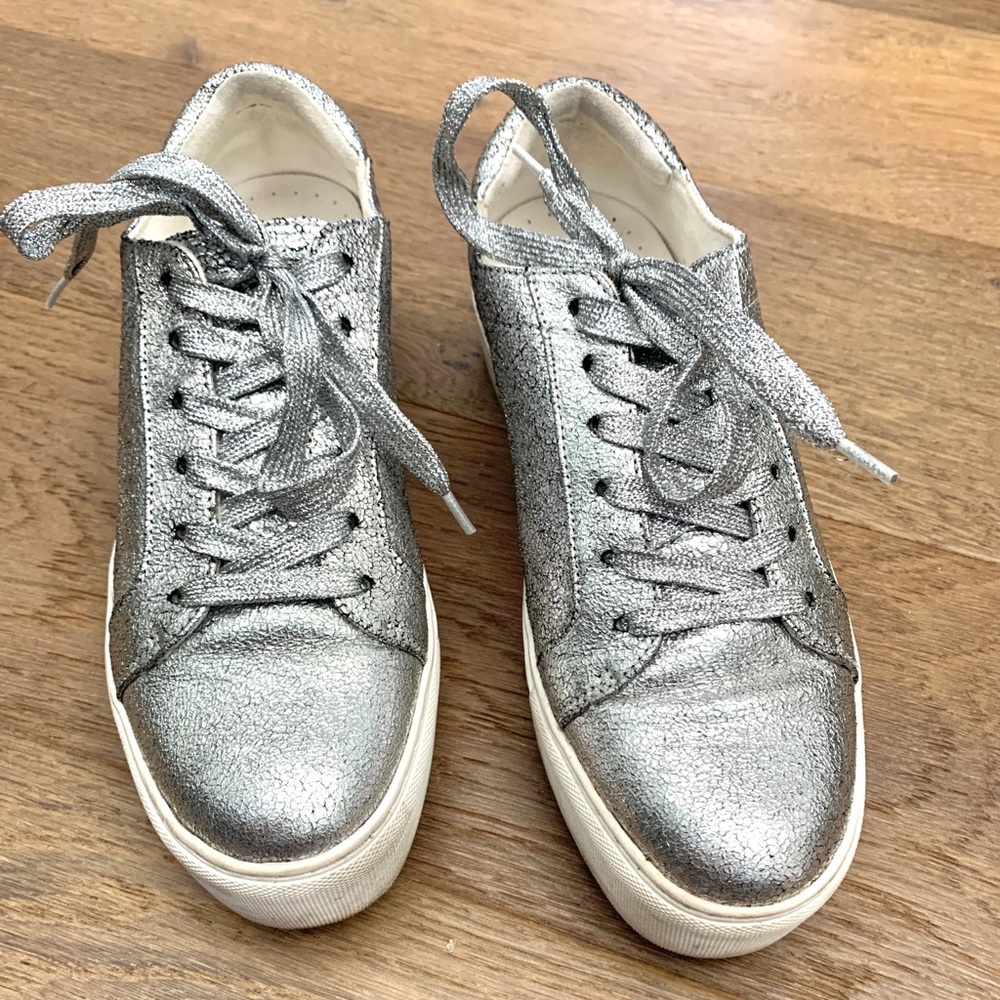 Kenneth Cole. Silver Color. Good condition.